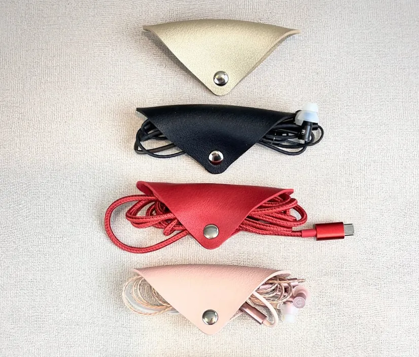 Cord Keepers. Pretty, Easy, Elegant Leather Organizers For Headphone and Chargers